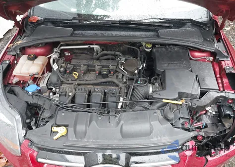 2014 Ford Focus Titanium z USA, uszkodzony, nr VIN 1FADP3J21EL309924